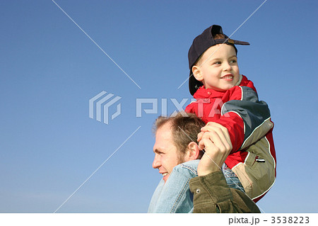 son on father shoulders son on father shoulders 3538223