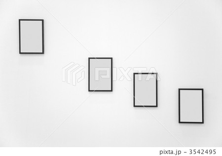 Four frames on white wall 3542495