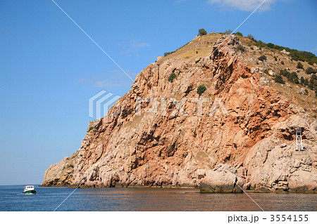 The ship floats about mountain. The ship floats about mountain. 3554155