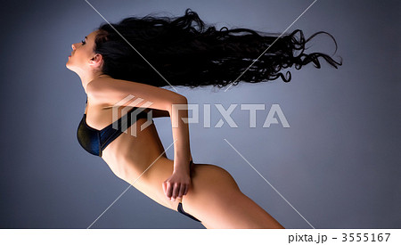 Young woman with fluttering hair 3555167