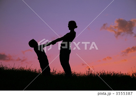 mother with child on sunset mother with child on sunset 3555387
