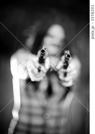 Woman with gun 3556201