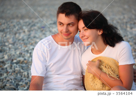 young pair on beach young pair on beach 3564104