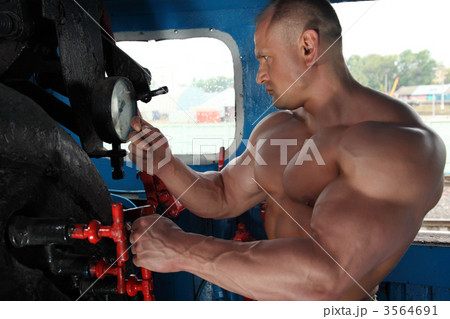 athlete in locomotive cabin 3564691