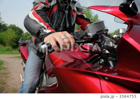 hand of motorcyclist  on country road 3564755