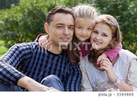 happy family of three outdoors happy family of three outdoors 3564869