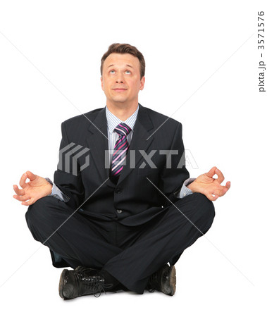 meditating businessman meditating businessman 3571576