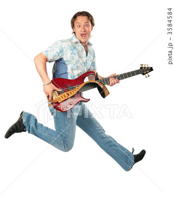 Young man with guitar jumping 3584584