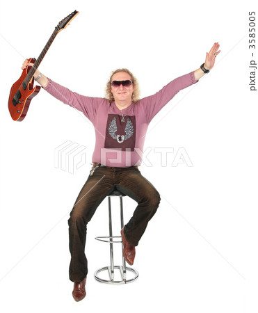 Man with guitar in raises hand Man with guitar in raises hand 3585005