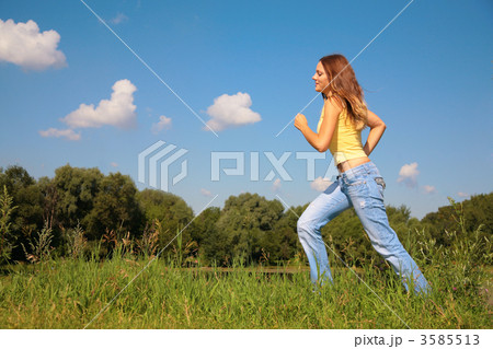 Young girl runs in park Young girl runs in park 3585513