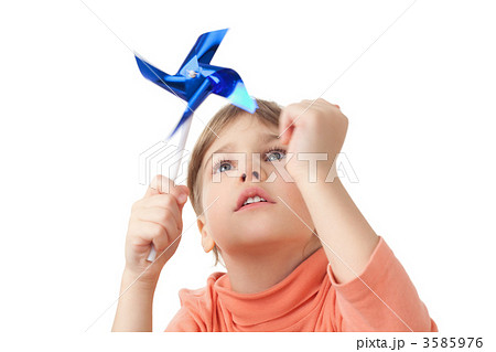 pretty little girl plays with toy propeller stick  isolated on w 3585976