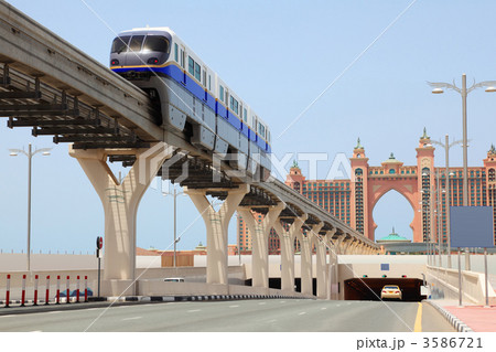 DUBAI - APRIL 19: Atlantis hotel and monorail train on a man-mad 3586721