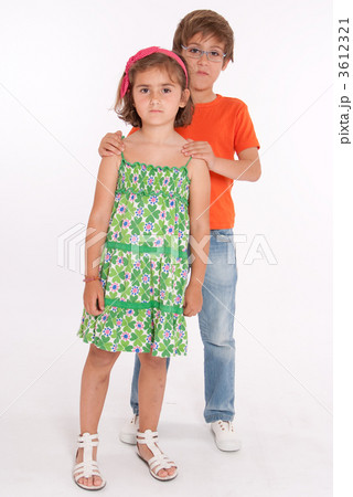 Boy and little girl standing Boy and little girl standing 3612321