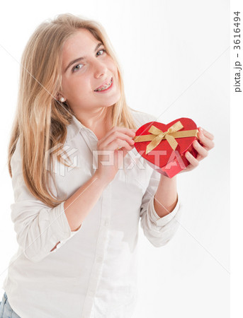 Young Girl with heart-shaped box Young Girl with heart-shaped box 3616494