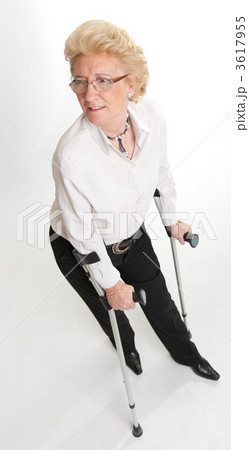 Senior woman with crutches 3617955