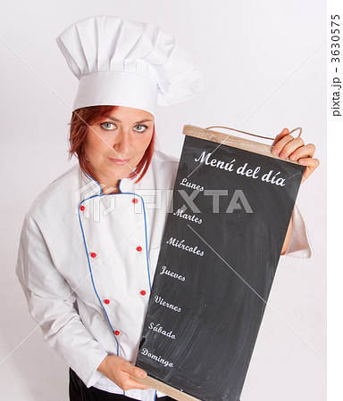 Chef holding menu board 3630575