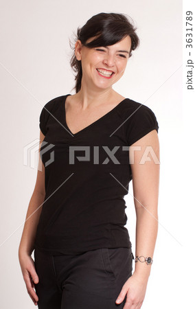 Cheerful cute brunette in black Cheerful cute brunette in black 3631789