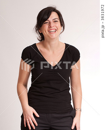 laughing brunette in black laughing brunette in black 3631972