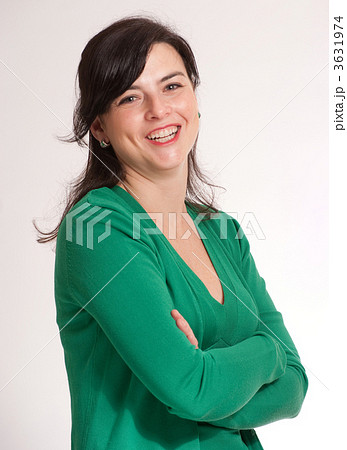 Laughing brunette in green 3631974