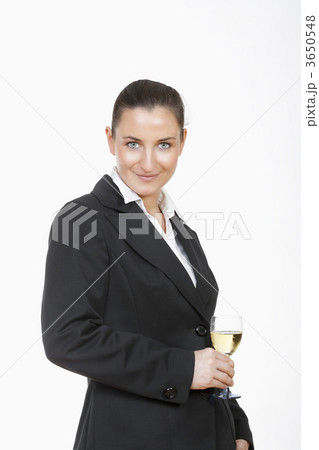 businesswoman with glass of wine businesswoman with glass of wine 3650548