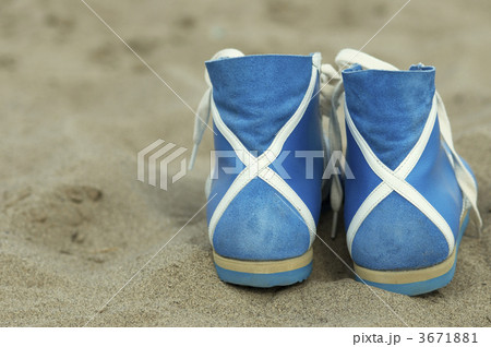 foot-gear on the beach 3671881
