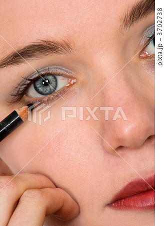 applying eye liner - makeup series 3702738