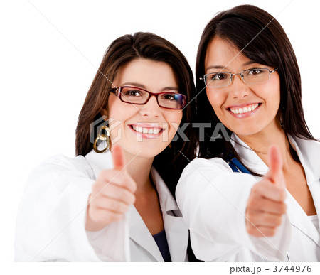 Doctors with thumbs up Doctors with thumbs up 3744976