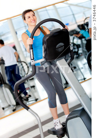 Girl exercising at the gym Girl exercising at the gym 3746446