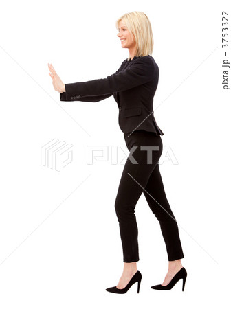 Business woman pushing something 3753322