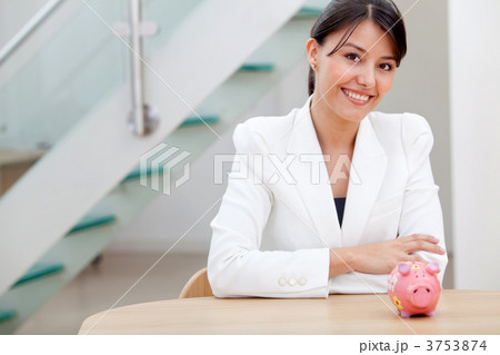 Business woman with a piggybank 3753874