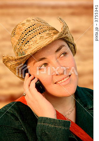 girl talking on a cellphone at sunset 3755341