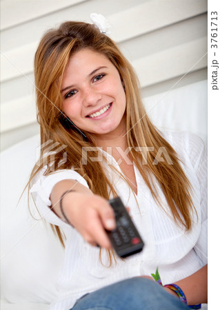 Girl with a remote control 3761713