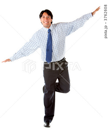 Business man keeping balance Business man keeping balance 3762608