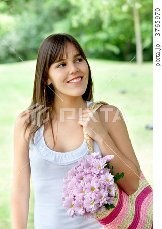 Girl carrying flowers 3765970