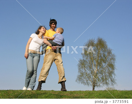 family stand with son. spring family stand with son. spring 3773591