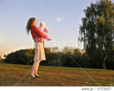 mother with baby on sunset meadow mother with baby on sunset meadow 3773927