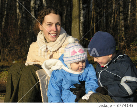 mother with children. winter. sun. mother with children. winter. sun. 3774148