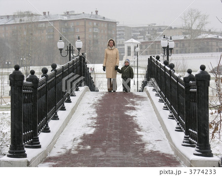 mother with son on winter bridge mother with son on winter bridge 3774233