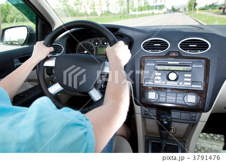 women driving a car 3791476