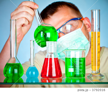Young scientist in laboratory with test tubes Young scientist in laboratory with test tubes 3792016
