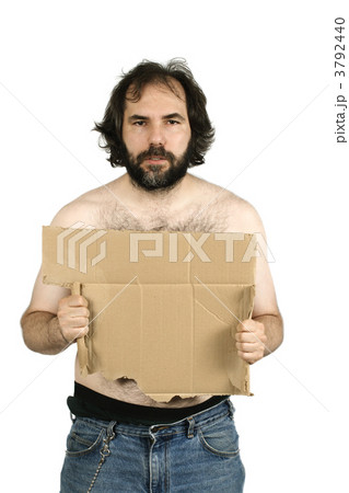 Begging with cardboard sign 3792440