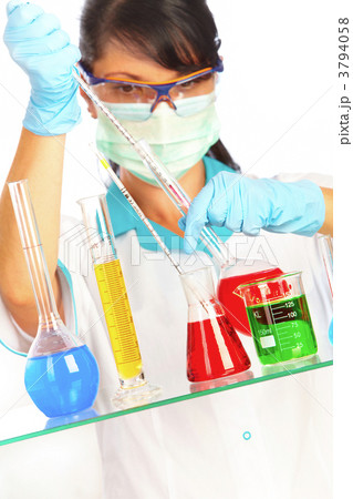 scientist in laboratory with test tubes 3794058