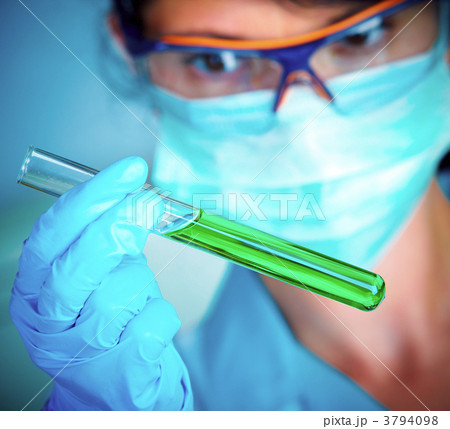 scientist in laboratory with test tubes scientist in laboratory with test tubes 3794098