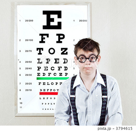 person wearing spectacles in an office at the doctor 3794615