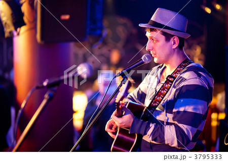musician plays a guitar musician plays a guitar 3795333