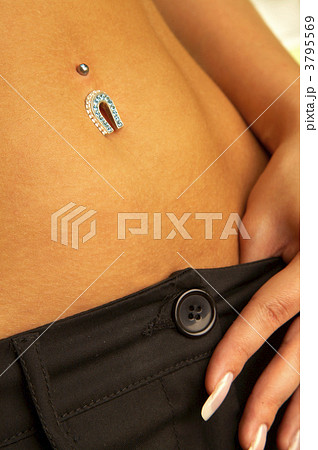 female navel with piercing 3795569