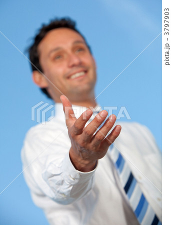 Business man stretching his hand Business man stretching his hand 3797903