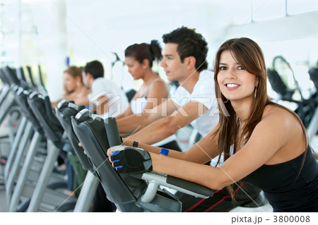 Gym people on cardio machines Gym people on cardio machines 3800008