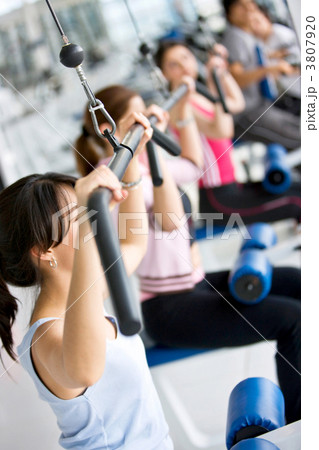 People exercising at the gym 3807920