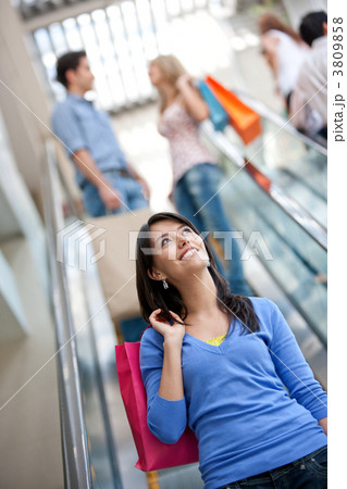 Shopping woman on scalators Shopping woman on scalators 3809858